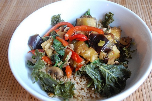 mixed vegetable stir-fry in a bowl over rice