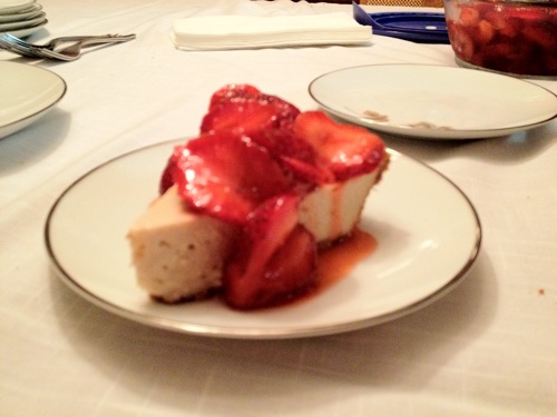 vegan cheesecake topped with strawberries